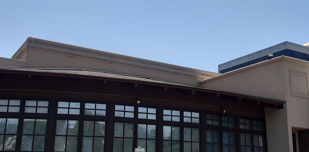 After: Commercial building exterior and roof soft washed in the Little Rock area