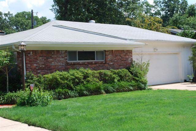 Brick home exterior after a soft wash house washing in Little Rock AR