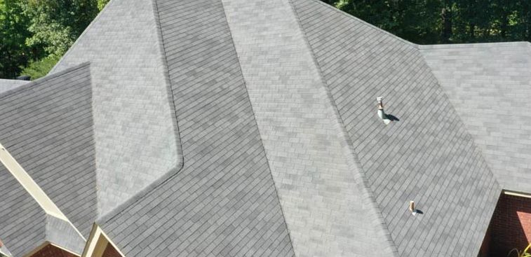 After: Roof ridge line with algae staining cleaned by soft wash in central Arkansas
