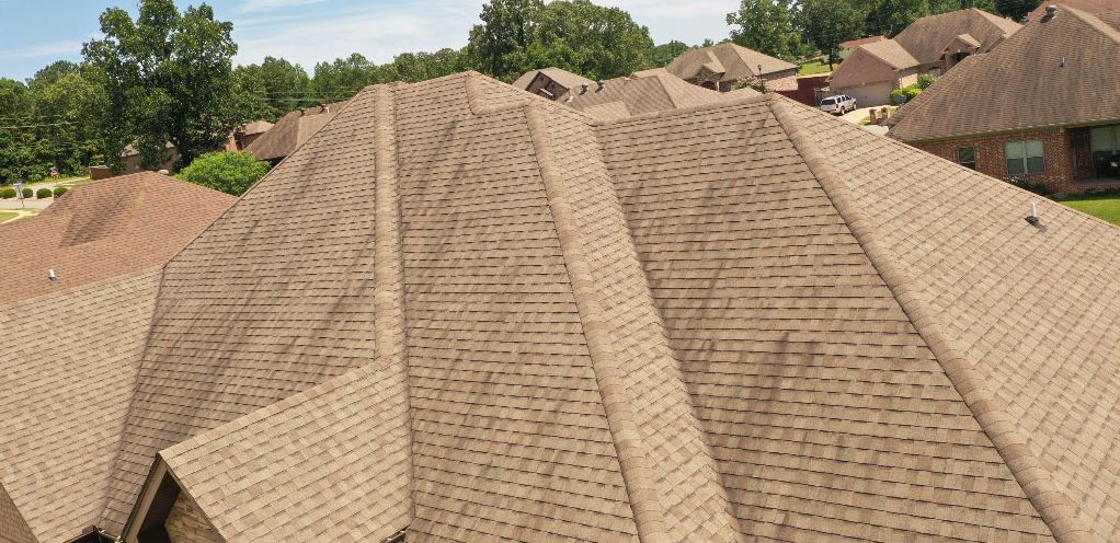 Before: Hip roof with algae streaks removed by roof cleaning in central Arkansas