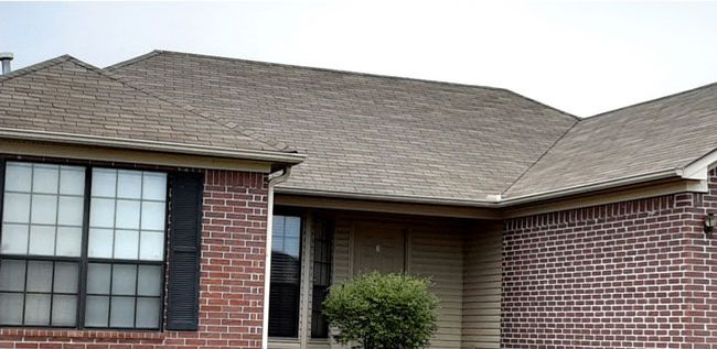 After: Brick ranch home with black roof streaks removed in central Arkansas