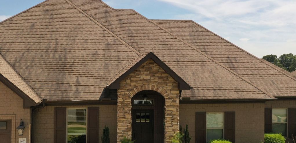 Before: brown shingle roof on a Little Rock AR home, soft washed clean by C & S Roof Cleaning