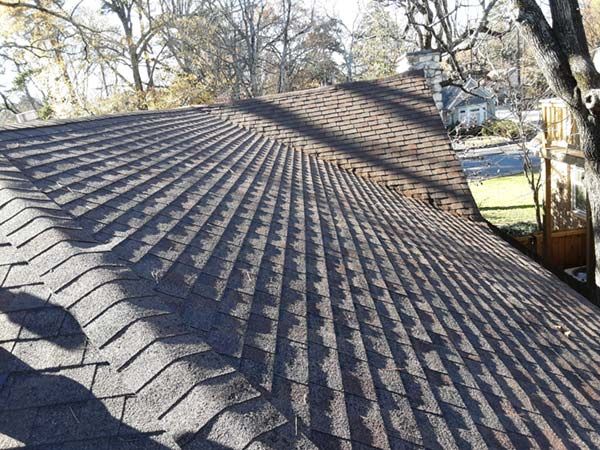 Roof edge and gutter line during a roof and gutter cleaning in Little Rock AR