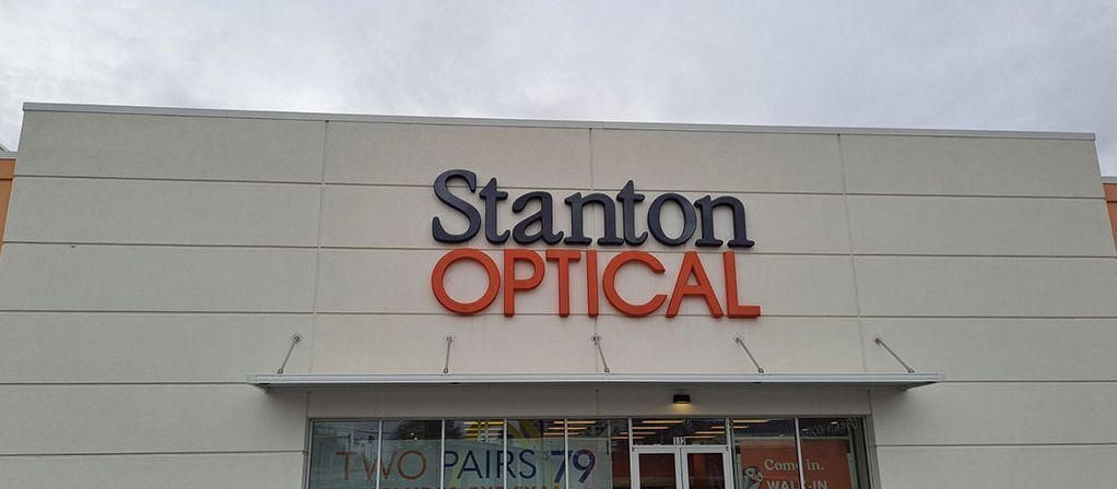 After: Stanton Optical storefront in Little Rock AR after mildew was soft washed off the building