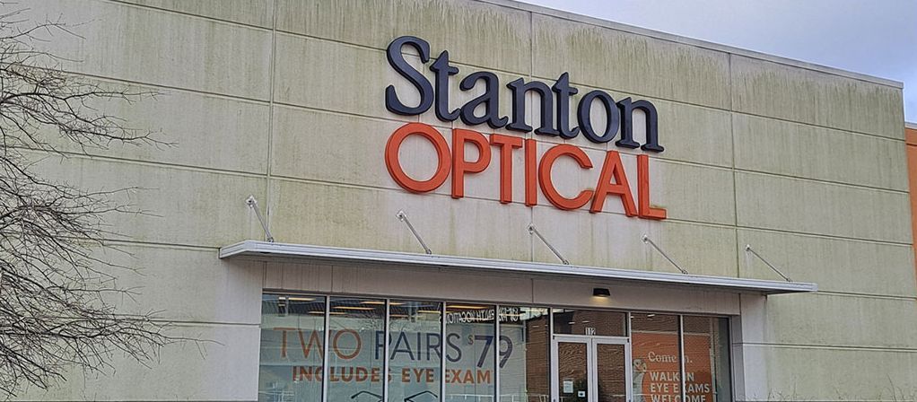 Before: Stanton Optical storefront in Little Rock AR after mildew was soft washed off the building